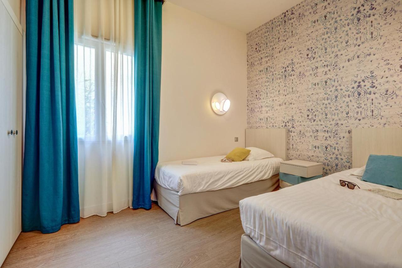 Residence Pierre & Vacances Premium Presqu'Ile De La Touques Deauville Exteriör bild A bedroom at the hotel